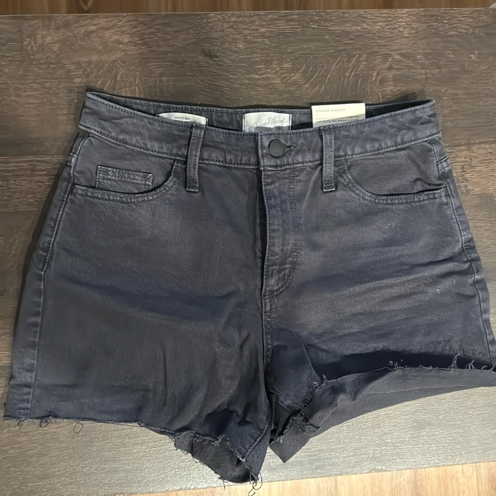 Size 4, fitted stretch shorts. New with tags. Very comfortable